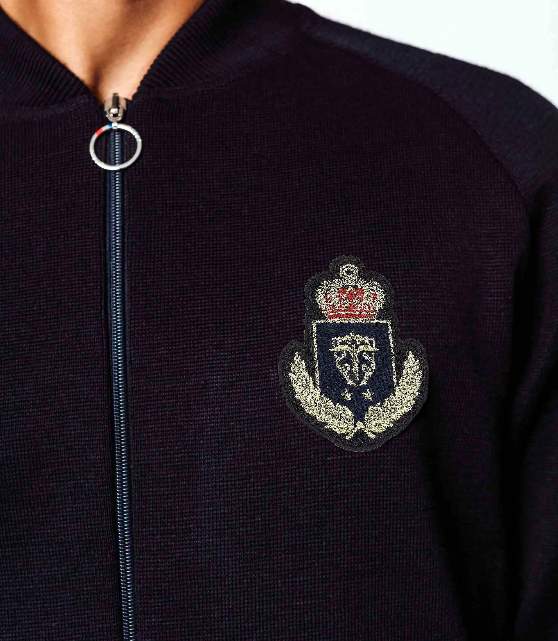Gilet zippé col teddy et blason